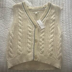 Never worn! Cute sweater vest for the holidays